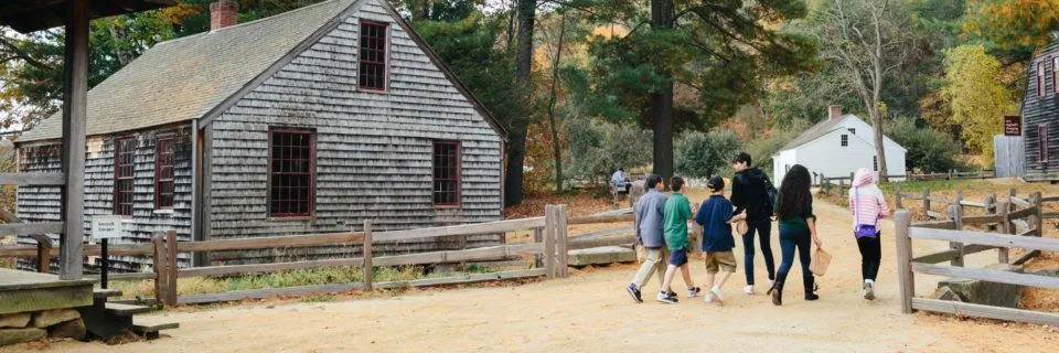 A group of students visit the mills at Old Sturbridge Village