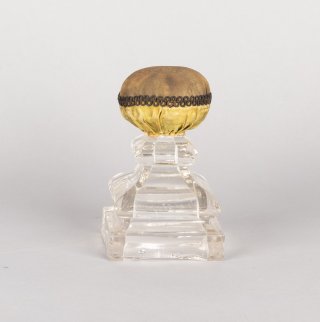 "Make-do" pin cushion from the OSV Museum Collection; pin sushion affixed to a broken candle stand